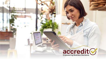 Woman working on tablet.