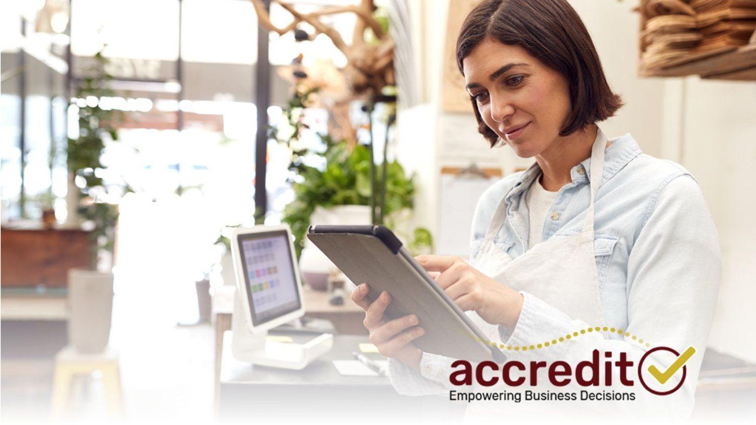 Woman working on tablet.