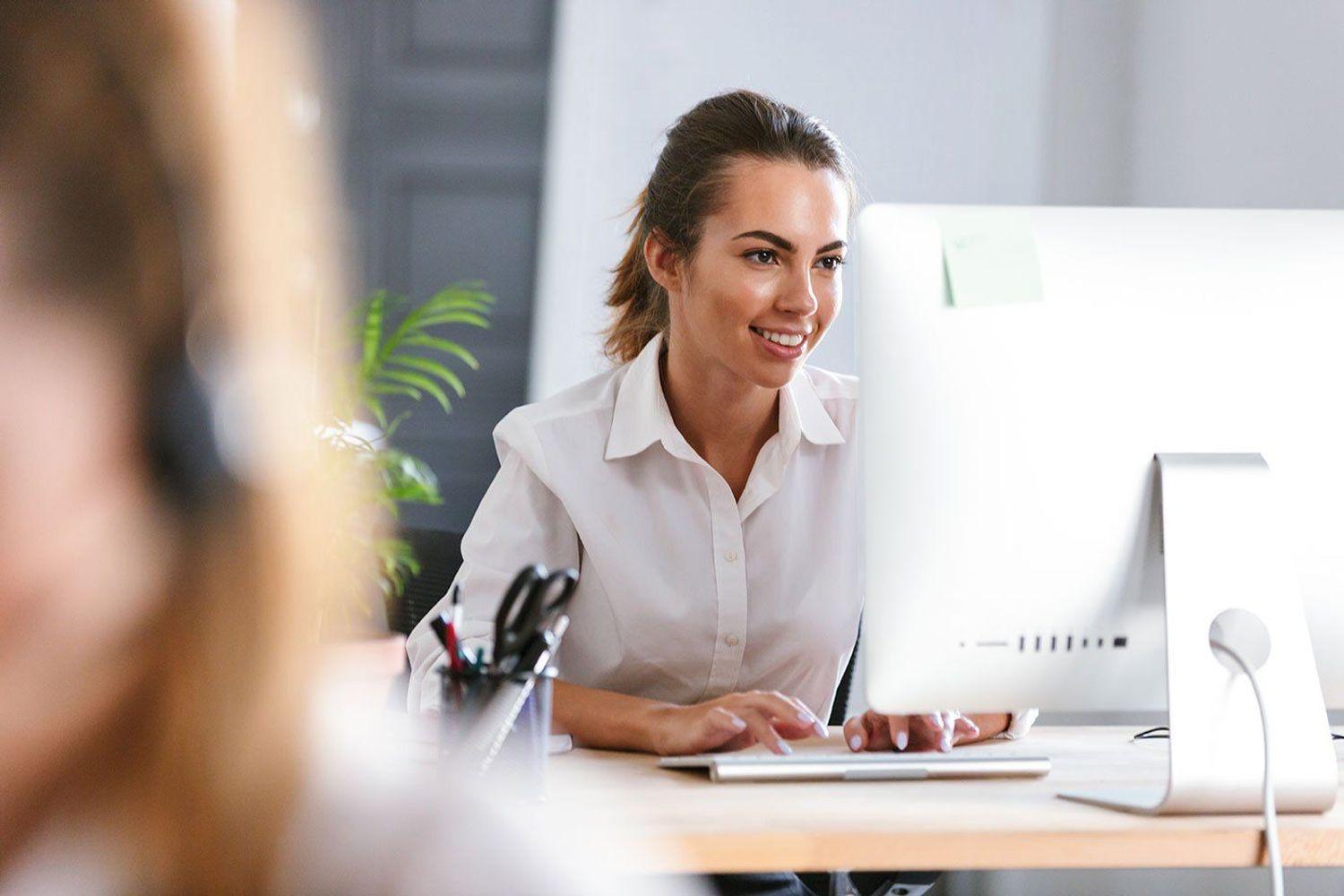 Woman working on computer.